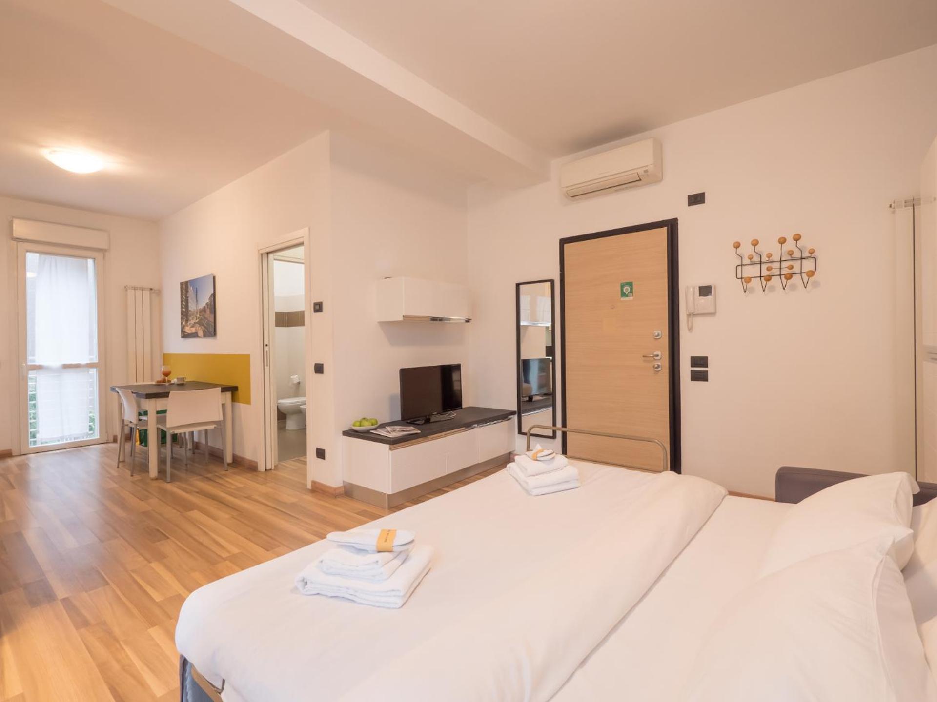 Rentopolis Apartments - Palazzo Candiani ミラノ エクステリア 写真