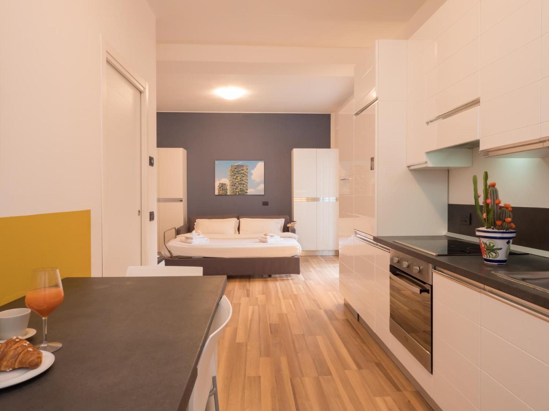 Rentopolis Apartments - Palazzo Candiani ミラノ エクステリア 写真