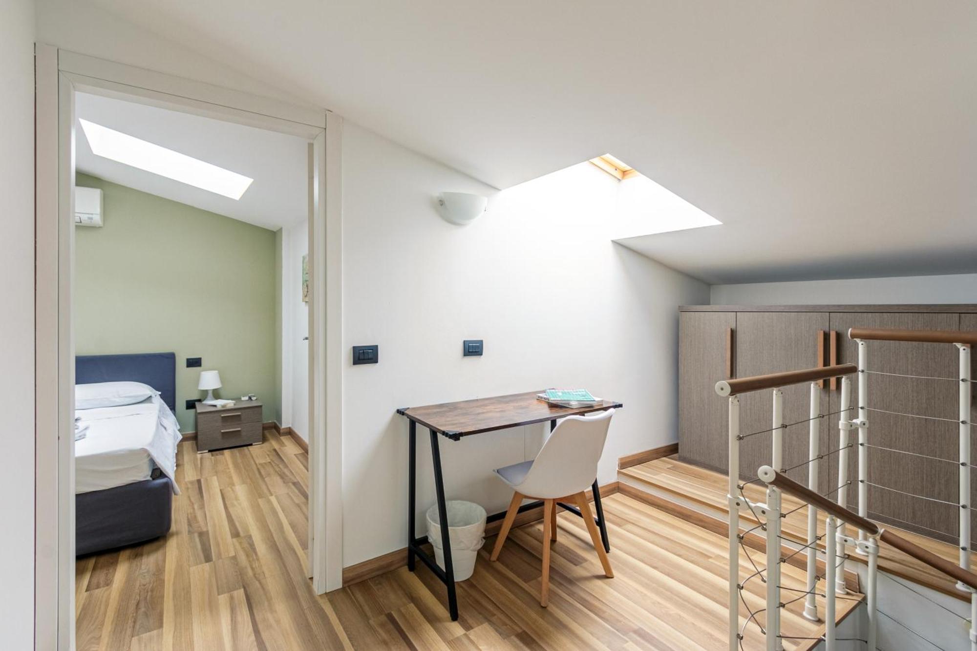 Rentopolis Apartments - Palazzo Candiani ミラノ エクステリア 写真