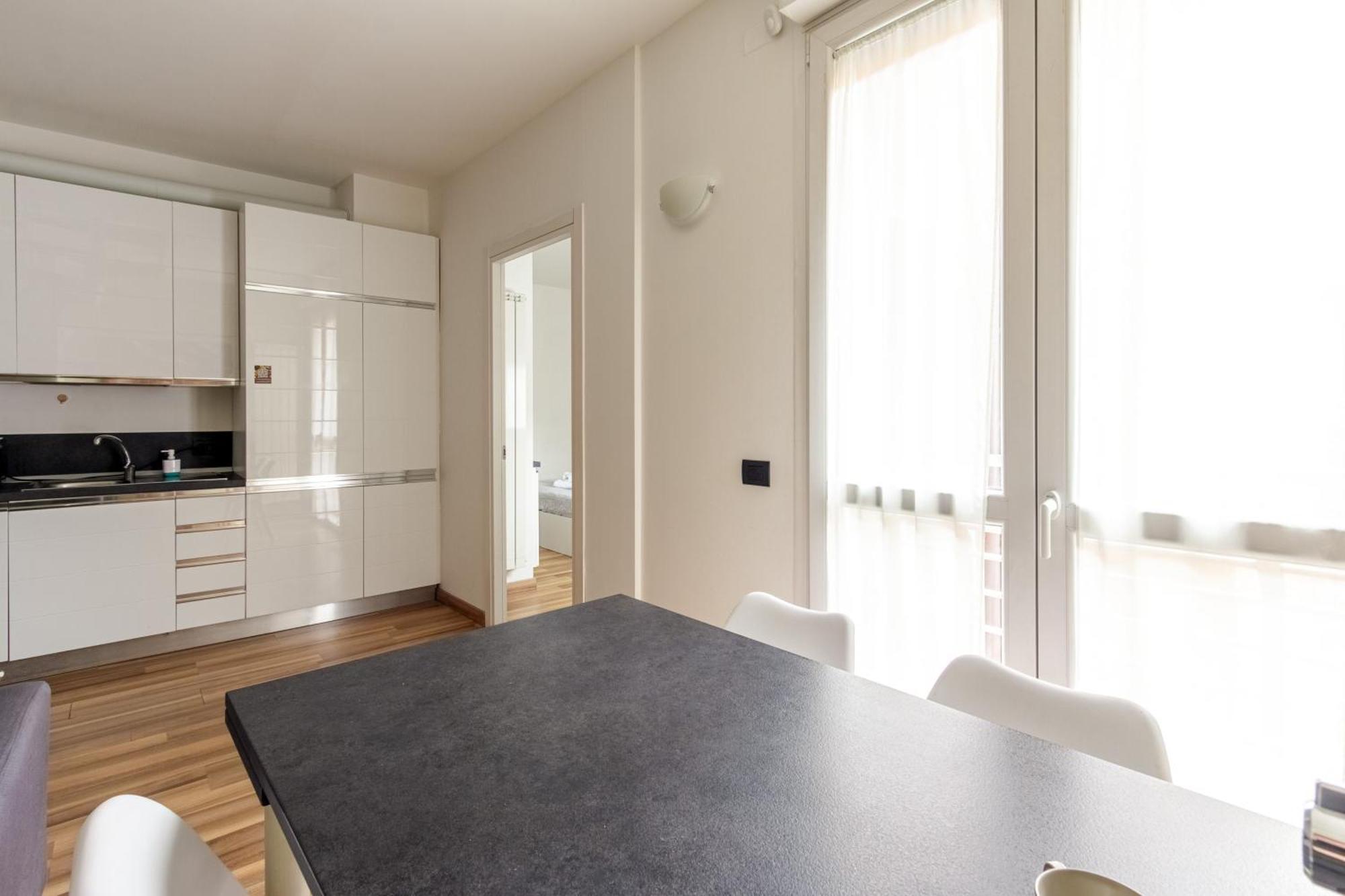 Rentopolis Apartments - Palazzo Candiani ミラノ エクステリア 写真