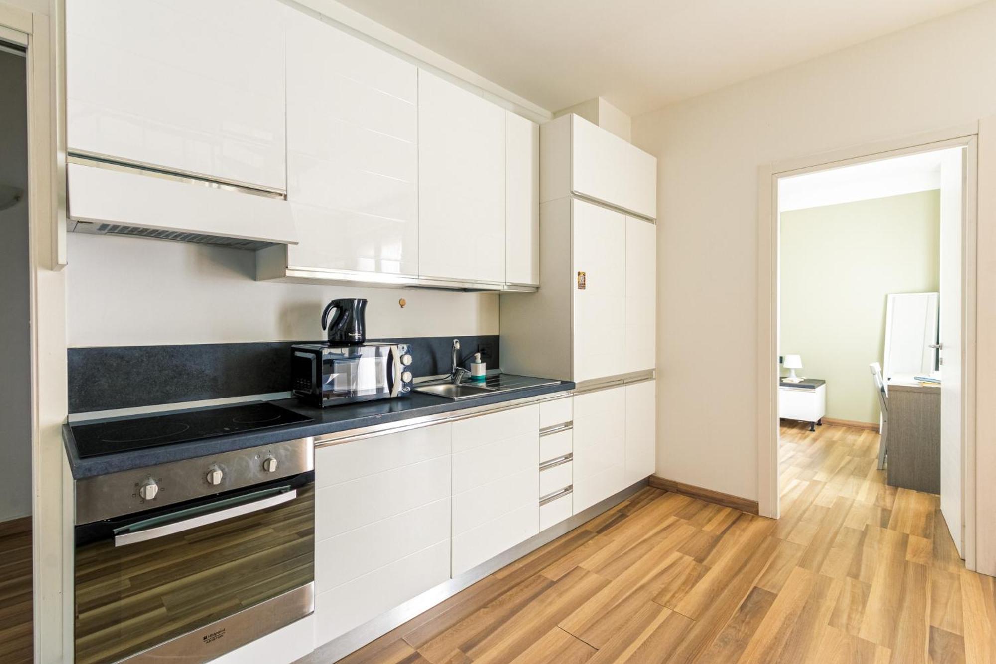 Rentopolis Apartments - Palazzo Candiani ミラノ エクステリア 写真