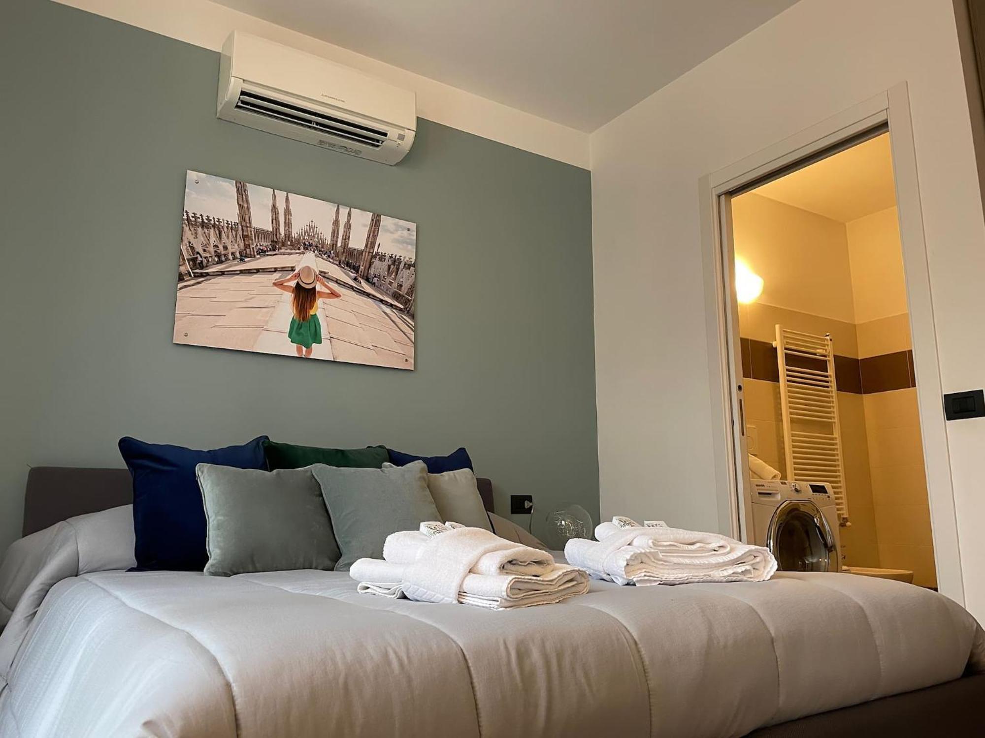 Rentopolis Apartments - Palazzo Candiani ミラノ エクステリア 写真